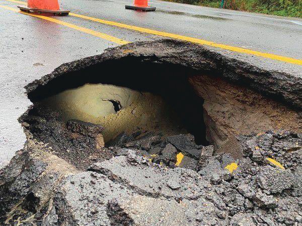A sinkhole on state Route 504 westbound is pictured in this photograph from the state Department of Transportation.